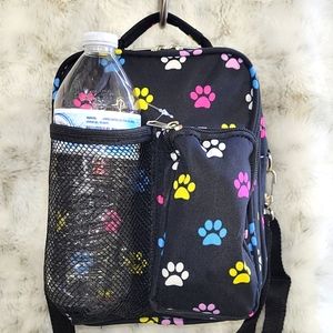 Canvas crossbody bag that can hold water bottle. Lots of room.